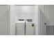 Laundry room with washer, dryer, and shelving at 14824 Lyla Ter, Bradenton, FL 34211