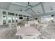 Relaxing outdoor bar and lounge area with ceiling fans at 14824 Lyla Ter, Bradenton, FL 34211