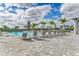 Resort-style pool with lounge chairs and umbrellas at 14824 Lyla Ter, Bradenton, FL 34211
