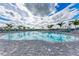 Relaxing resort-style pool with lounge chairs and a playful water feature for  at 14824 Lyla Ter, Bradenton, FL 34211