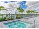 Relaxing spa with lounge chairs nearby at 14824 Lyla Ter, Bradenton, FL 34211