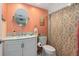 Bright bathroom with updated vanity and shower at 1512 Pelican Cove Rd # 239, Sarasota, FL 34231