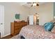 Bright bedroom with ensuite access and built-in dresser at 1512 Pelican Cove Rd # 239, Sarasota, FL 34231