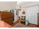 Well-lit bedroom with large closet and wood floors at 1512 Pelican Cove Rd # 239, Sarasota, FL 34231