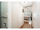 Long hallway with built-in storage and access to bedroom and bathroom at 1512 Pelican Cove Rd # 239, Sarasota, FL 34231