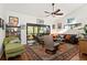 Spacious living room with hardwood floors and ample natural light at 1512 Pelican Cove Rd # 239, Sarasota, FL 34231