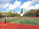 Well-maintained tennis courts for residents' recreation at 1512 Pelican Cove Rd # 239, Sarasota, FL 34231