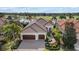 Single-Gathering home with two-car garage and landscaping at 15608 Leven Links Pl, Lakewood Ranch, FL 34202