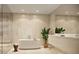 Spa-like bathroom with a freestanding tub at 1703 Main St # 1103, Sarasota, FL 34236