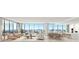 Spacious living room with floor-to-ceiling windows and city views at 1703 Main St # 1103, Sarasota, FL 34236