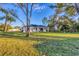 Spacious backyard with lush green grass at 1732 Jagust Rd, North Port, FL 34288