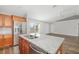 Modern kitchen features stainless steel appliances and granite countertops at 1790 S Biscayne Dr, North Port, FL 34287