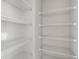 Walk-in pantry with wire shelving for ample storage at 1790 S Biscayne Dr, North Port, FL 34287