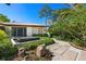 Serene water fountain with stone accents and lush greenery at 1804 N Lake Shore Dr, Sarasota, FL 34231