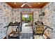 Home gym with two treadmills and views of the pool at 1804 N Lake Shore Dr, Sarasota, FL 34231
