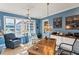 Home office with built-in desk and ample natural light at 1804 N Lake Shore Dr, Sarasota, FL 34231