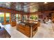 Gourmet kitchen with large island and stainless steel appliances at 1804 N Lake Shore Dr, Sarasota, FL 34231