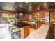 Spacious kitchen boasting double islands and a tin ceiling at 1804 N Lake Shore Dr, Sarasota, FL 34231