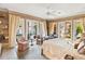 Spacious main bedroom with French doors leading to the patio at 1804 N Lake Shore Dr, Sarasota, FL 34231