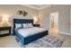 Spacious bedroom with plush carpet and large window at 2219 Greenley Rd, North Port, FL 34286