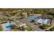 Community overview showcasing amenities like pool, courts and shuffleboard at 25100 Sandhill Blvd # 102, Punta Gorda, FL 33983