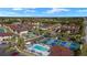 Aerial view of community amenities, including pool and courts at 25100 Sandhill Blvd # 102, Punta Gorda, FL 33983