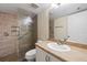Updated bathroom with walk-in shower and new vanity at 25100 Sandhill Blvd # 102, Punta Gorda, FL 33983
