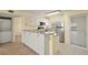 Kitchen with stainless steel appliances and white cabinets at 25100 Sandhill Blvd # 102, Punta Gorda, FL 33983