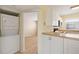 Stackable washer and dryer in a convenient laundry room at 25100 Sandhill Blvd # 102, Punta Gorda, FL 33983