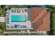 Relaxing community pool with plenty of lounge chairs at 25100 Sandhill Blvd # 102, Punta Gorda, FL 33983