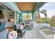 Outdoor kitchen with stainless steel appliances and granite counters at 262 Island Cir, Sarasota, FL 34242