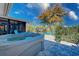 Relaxing hot tub overlooking a serene lake offers a private outdoor oasis at 309 South Dr, Nokomis, FL 34275