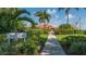 Walkway to Longboat Key Yacht Club, lush landscaping at 3365 Bayou Gate, Longboat Key, FL 34228