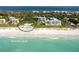 Beach club with private access, cabanas and lounge chairs at 3371 Bayou Sound, Longboat Key, FL 34228