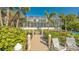 Private dock with walkway leading to waterfront at 3371 Bayou Sound, Longboat Key, FL 34228