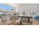 Spacious living area with high ceilings and pool access at 3371 Bayou Sound, Longboat Key, FL 34228