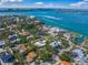 Stunning aerial view showcasing the home's location and proximity to the bay at 3445 Anglin Dr, Sarasota, FL 34242