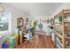 Bright office space with bamboo shelving, desk, and natural lighting at 3445 Anglin Dr, Sarasota, FL 34242