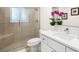 Bathroom with walk-in shower and white vanity at 355 N Washington Dr, Sarasota, FL 34236