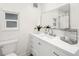 Clean bathroom with white vanity and fixtures at 355 N Washington Dr, Sarasota, FL 34236