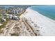 Aerial view of beachfront property with ocean and residential areas at 355 N Washington Dr, Sarasota, FL 34236