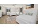 Spacious bedroom with two beds and hardwood floors at 355 N Washington Dr, Sarasota, FL 34236