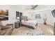Bright bedroom with comfortable bed and hardwood floors at 355 N Washington Dr, Sarasota, FL 34236