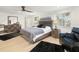 Spacious bedroom with king-size bed, walk-in closet, and ample natural light at 355 N Washington Dr, Sarasota, FL 34236