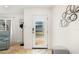 Bright and airy entryway with a glass front door at 355 N Washington Dr, Sarasota, FL 34236