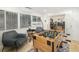 Relaxing game room featuring a foosball table and comfortable armchairs at 355 N Washington Dr, Sarasota, FL 34236