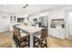 Well-appointed kitchen with white cabinets and an island at 355 N Washington Dr, Sarasota, FL 34236