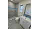 Updated bathroom with walk-in shower and modern vanity at 3813 42Nd W St # 37, Bradenton, FL 34205