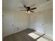 Spacious bedroom with two doors and a ceiling fan at 3813 42Nd W St # 37, Bradenton, FL 34205