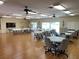 Large community room with tables and chairs at 3813 42Nd W St # 37, Bradenton, FL 34205